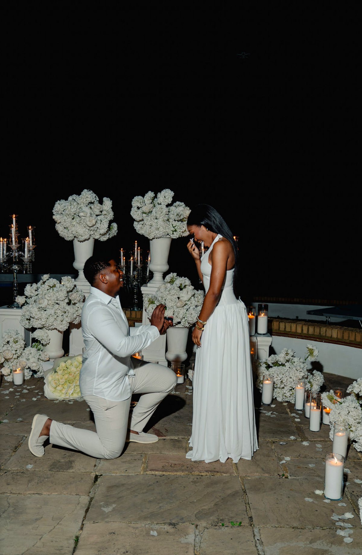 Denzil on one knee